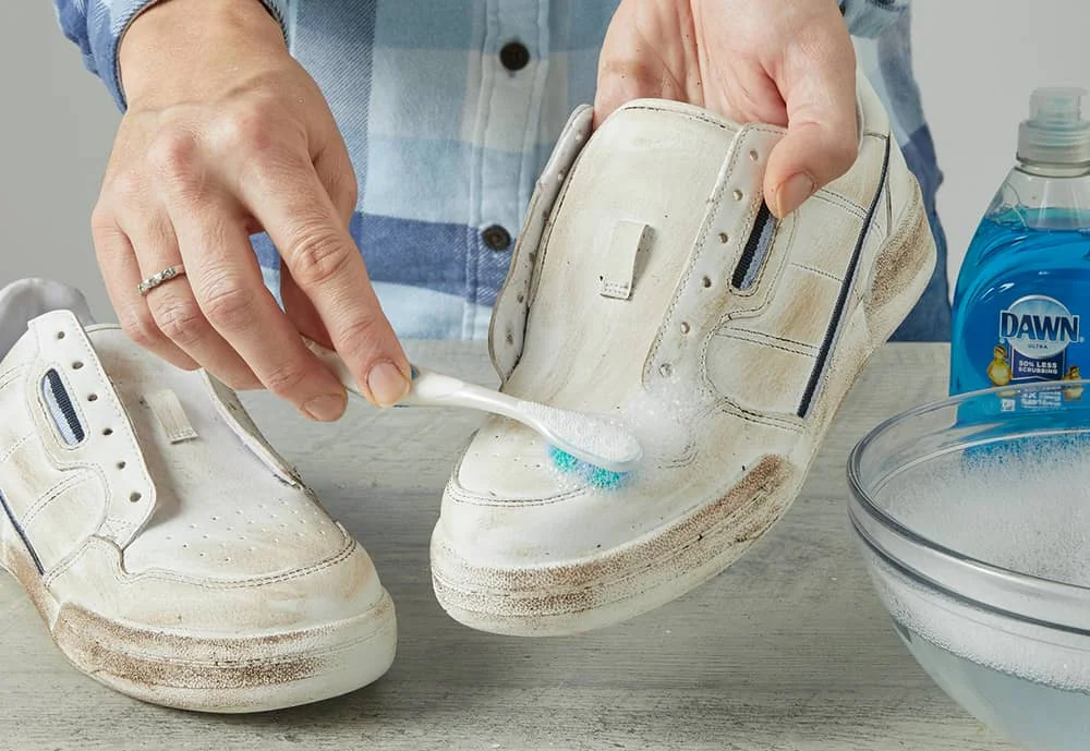 toothbrush to clean white shoes