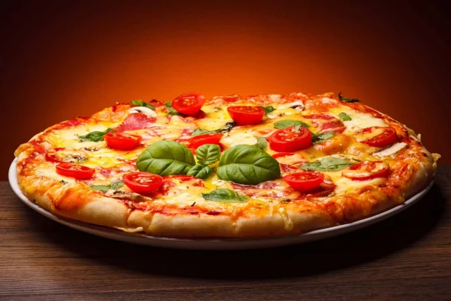 How Long Can Pizza Sit Out Before It Becomes A Health Hazard?
